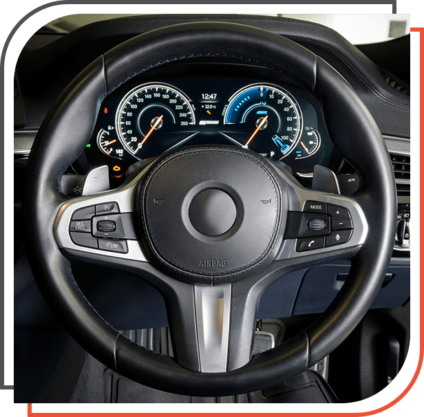 Interior view of car with steering wheel