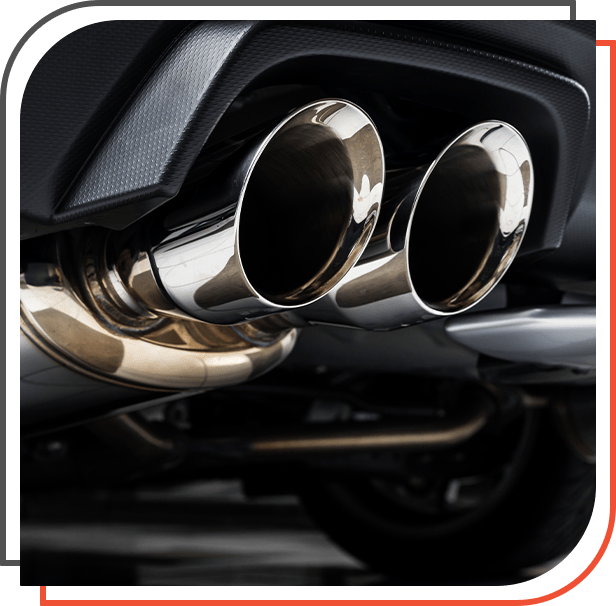 Closeup of clean car muffler undergoing exhaust system repair